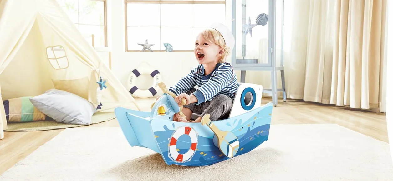 Hape Schaukelboot, fördert Balance und Motorik, mit funktionalen Ruderpaddeln und gepolstertem Sitz, Holz-Schaukelspielzeug ab 12 Monaten